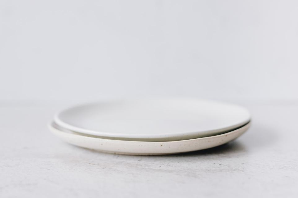white round plate on white table